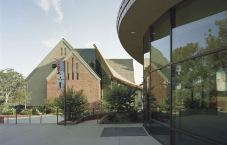 A building with a large window and a glass wall.