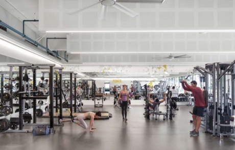 A gym with people working out in it