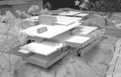 A black and white photo of a model building.